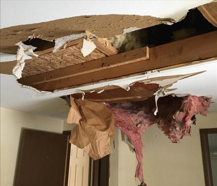 Ceiling damage due to a water leak.