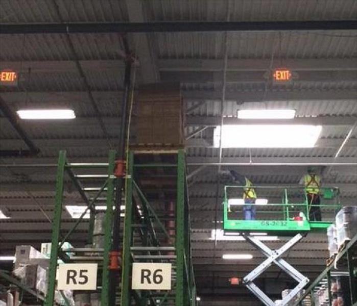 Scissor lift in a warehouse