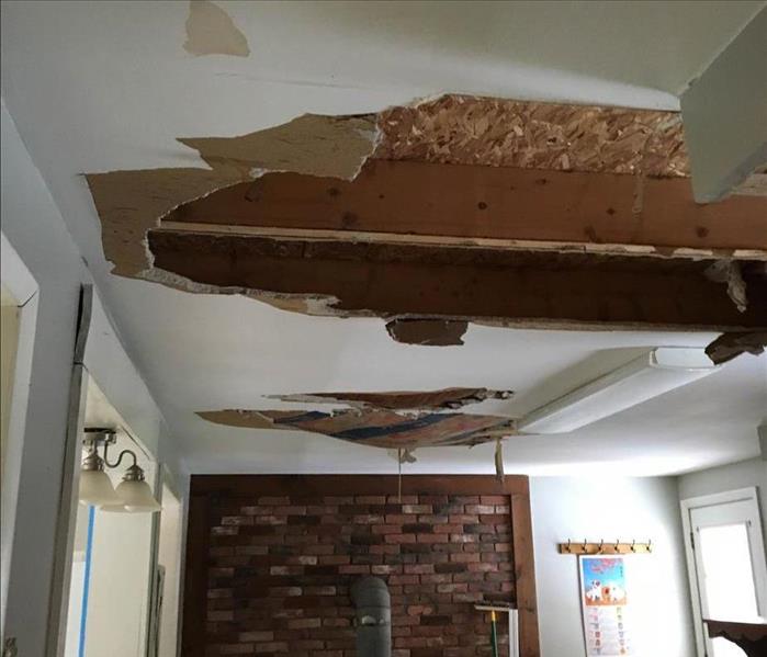 Ceiling damage after a water leak.