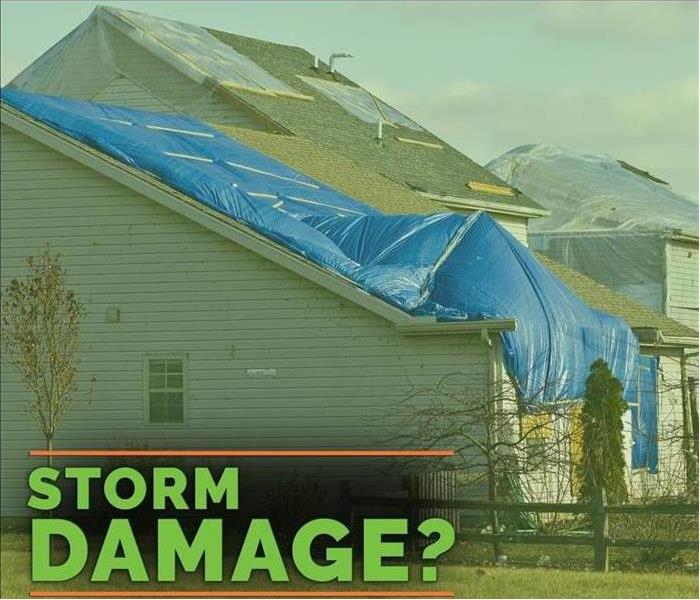 SERVPRO Storm Damage? Tarped roof after storm damage