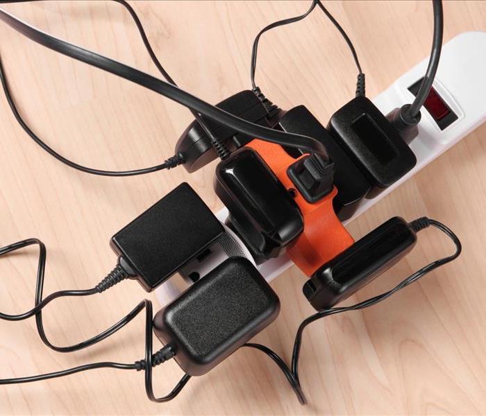 Power strip overloaded with electrical plugs
